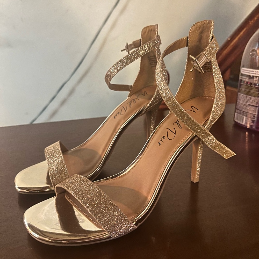Never worn gold heels
